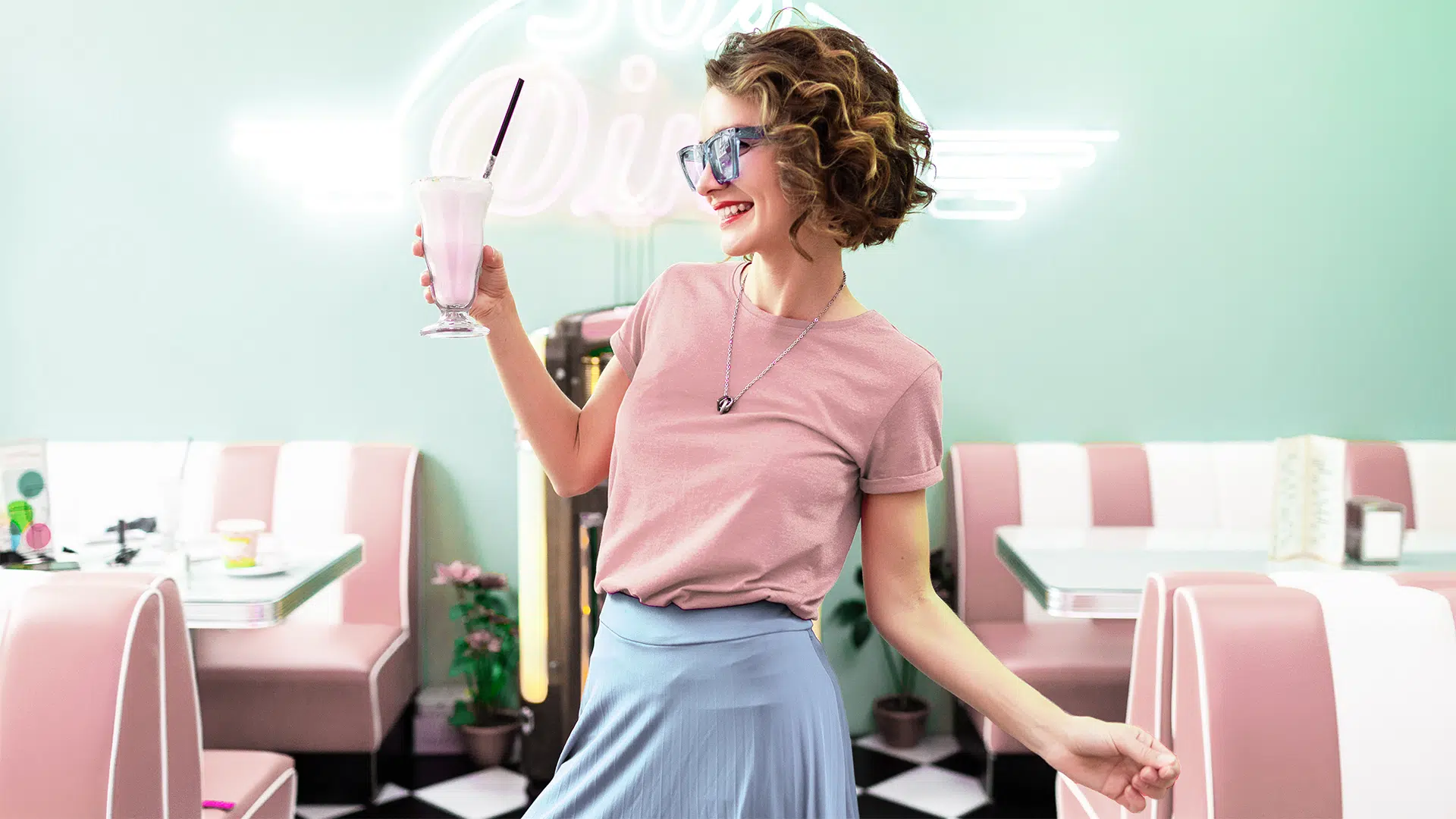 A woman holding a wii remote