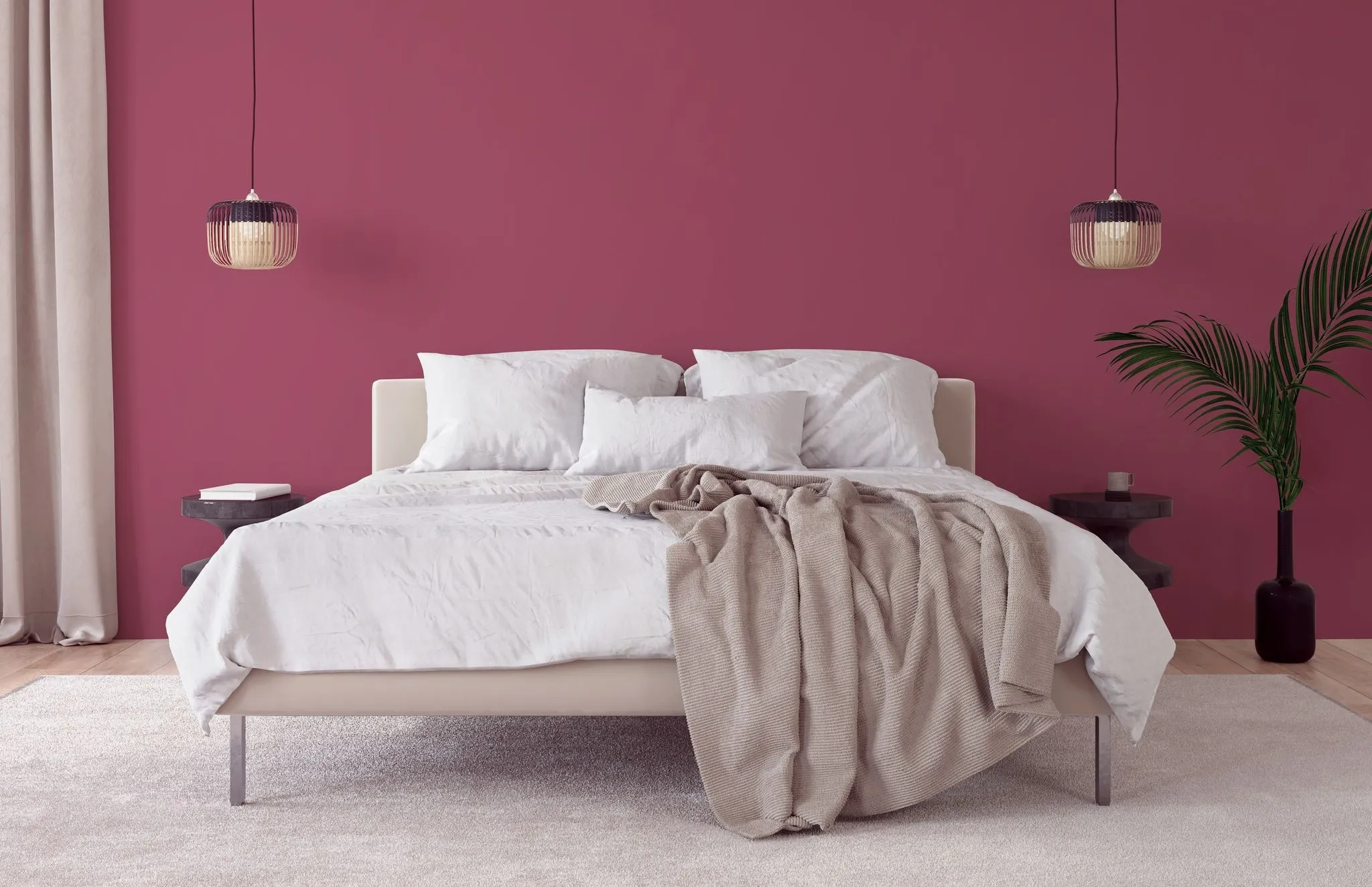 A bedroom with a large bed in a room