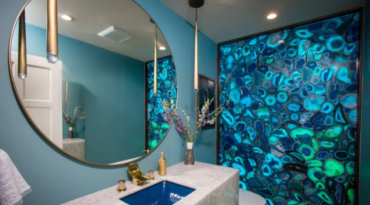 A room with a sink and a mirror