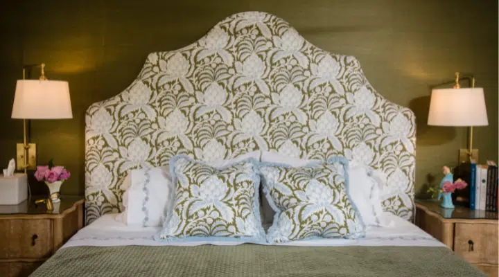 A lamp that is on a bed