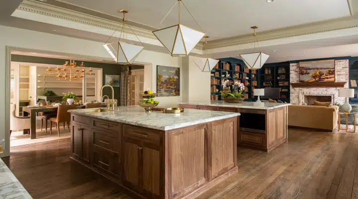 A kitchen with an island in the middle of a room