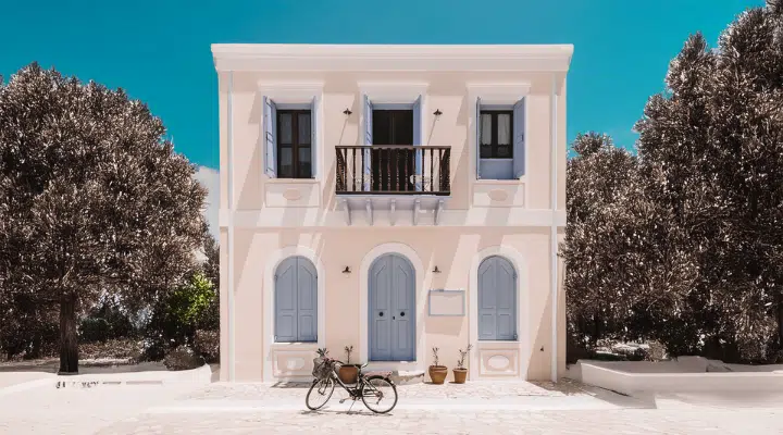 A bicycle parked in front of a building