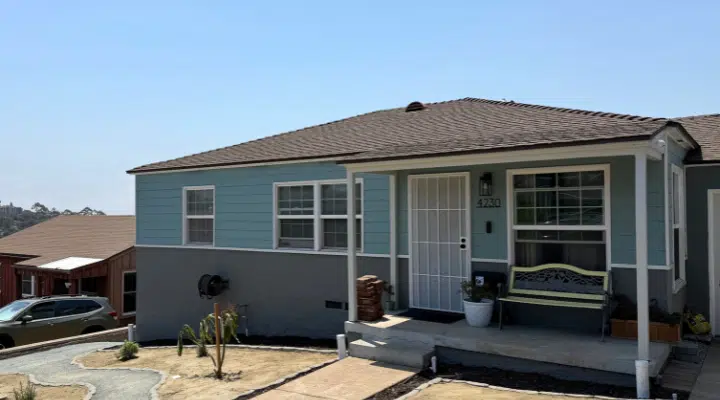 A house with a brick building