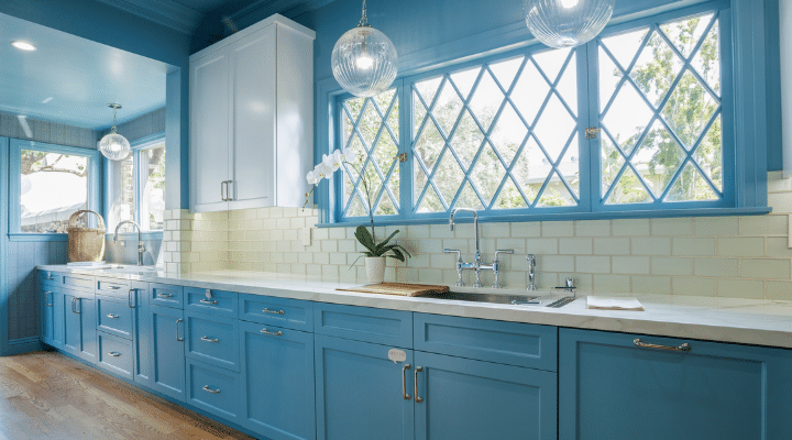 A kitchen with a sink and a window